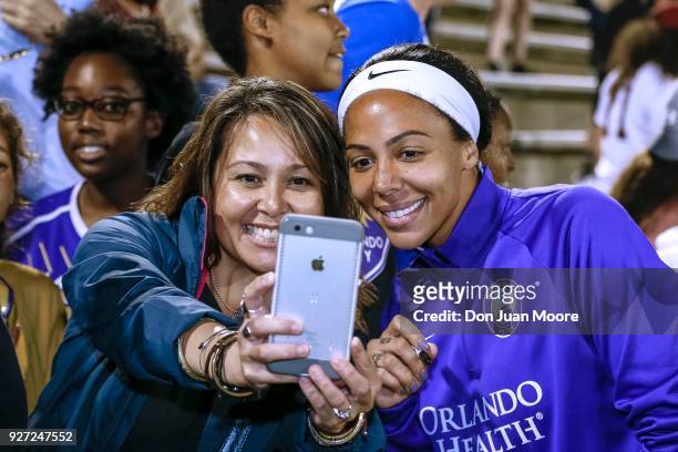 Sydney Leroux of the Orlando Pride take a selfie with a fan after a pre-season match against the Florida State Seminoles at the Seminole Soccer...