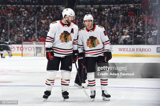 Brent Seabrook and Patrick Kane of the Chicago Blackhawks converse during a game against the Los Angeles Kings at STAPLES Center on March 3, 2018 in...