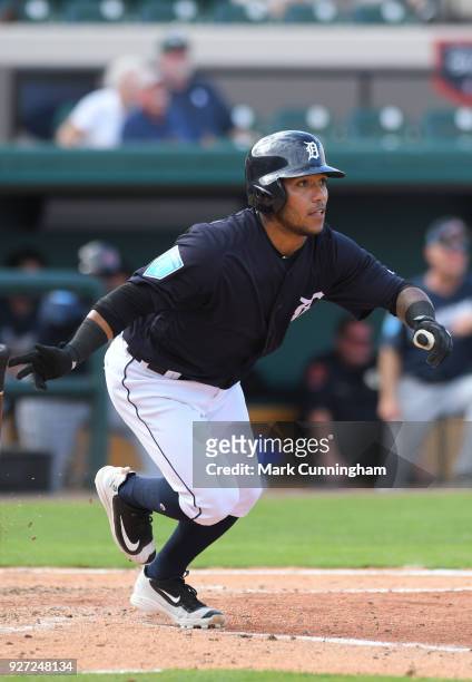 Alexi Amarista of the Detroit Tigers bats during the Spring Training game against the Atlanta Braves at Publix Field at Joker Marchant Stadium on...