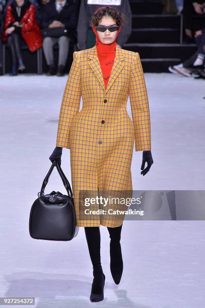 Model walks the runway at the Balenciaga Autumn Winter 2018 fashion show during Paris Fashion Week on March 4, 2018 in Paris, France.