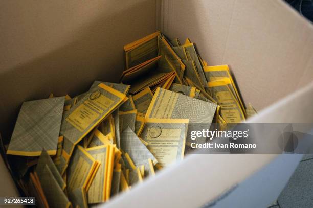 Paper ballots are counted after the end of voting in the Italian general elections on March 4, 2018 in Naples, Italy. The economy and immigration are...