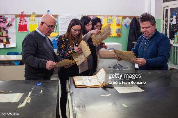 Paper ballots are counted after the end of voting in the Italian general elections on March 4, 2018 in Naples, Italy. The economy and immigration are...