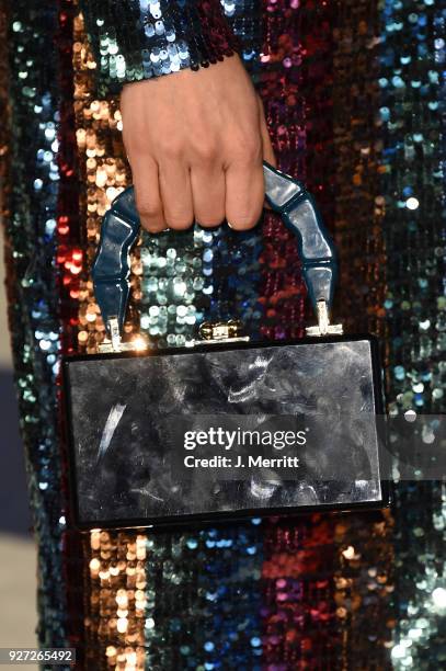 Constance Wu, purse detail, attends the 2018 Vanity Fair Oscar Party hosted by Radhika Jones at the Wallis Annenberg Center for the Performing Arts...