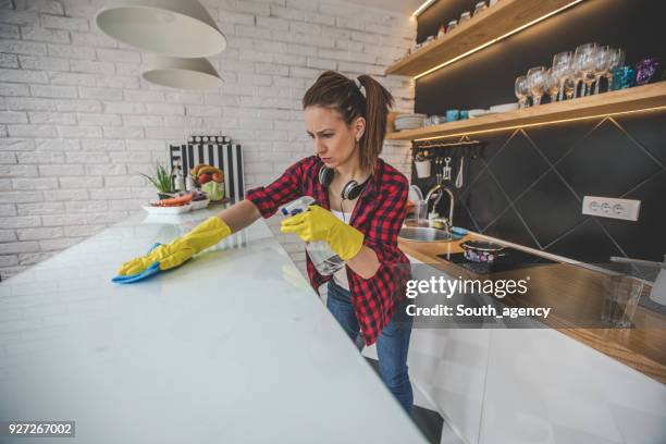 angry cleaning lady - kitchen bench top stock pictures, royalty-free photos & images