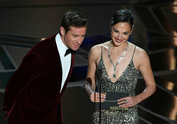 Actor Armie Hammer and Israeli actress Gal Gadot present the Oscar for Best Makeup and Hairstyling during the 90th Annual Academy Awards show on...