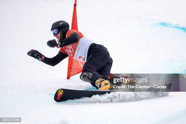 Andrey Sobolev of Russia in action during the Men's Snowboard Parallel Giant Slalom competition at Phoenix Snow Park on February 24, 2018 in...