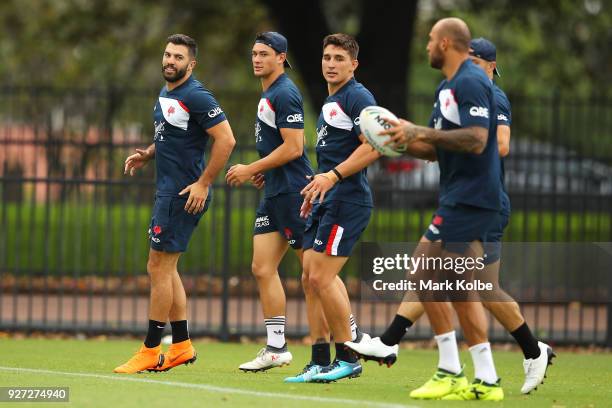 James Tedesco and Joseph Manu run during a Sydney Roosters NRL training session at Kippax Lake on March 5, 2018 in Sydney, Australia.