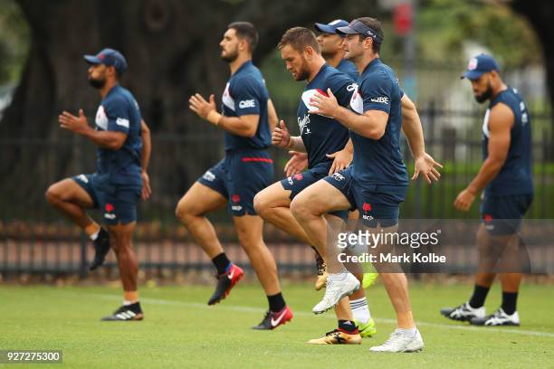 Jared Waerea-Hargreaves and Boyd Cordner run during a Sydney Roosters NRL training session at Kippax Lake on March 5, 2018 in Sydney, Australia.