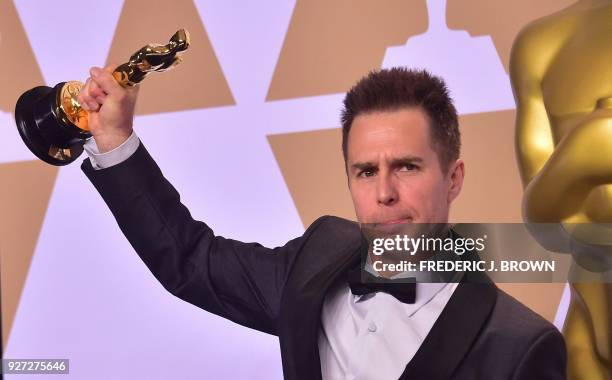 Sam Rockwell poses in the press room with the Oscar for Actor in Supporting Role during the 90th Annual Academy Awards on March 4 in Hollywood,...