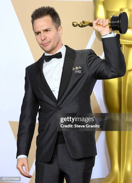 Actor Sam Rockwell winner of the Best Supporting Actor award for 'Three Billboards Outside Ebbing, Missouri, poses in the press room during the 90th...