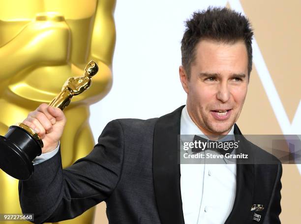 Actor Sam Rockwell winner of the Best Supporting Actor award for 'Three Billboards Outside Ebbing, Missouri, poses in the press room during the 90th...