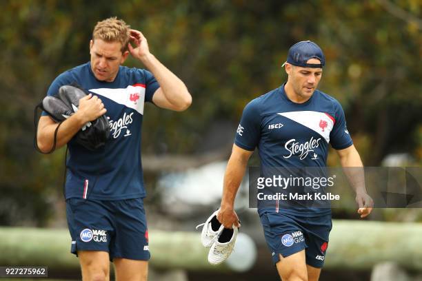 Mitchell Aubusson and Cooper Cronk arrive for a Sydney Roosters NRL training session at Kippax Lake on March 5, 2018 in Sydney, Australia.
