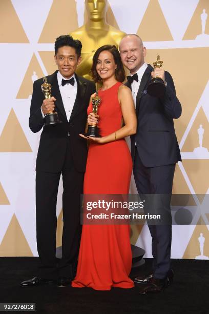 Make-up artists Kazuhiro Tsuji, Lucy Sibbick, and David Malinowski, winners of the Best Makeup and Hairstyling award for 'Darkest Hour,' pose in the...