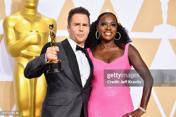 Sam Rockwell winner of the Best Supporting Actor for Three Billboards Outside Ebbing, Missouri poses with Viola Davis in the press room during the...