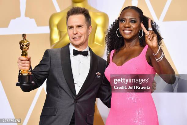 Sam Rockwell winner of the Best Supporting Actor for Three Billboards Outside Ebbing, Missouri poses with Viola Davis in the press room during the...