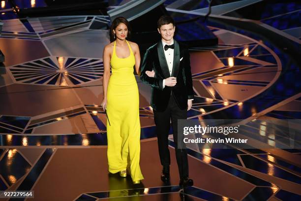 Actors Eiza Gonzalez and Ansel Elgort walk onstage during the 90th Annual Academy Awards at the Dolby Theatre at Hollywood & Highland Center on March...