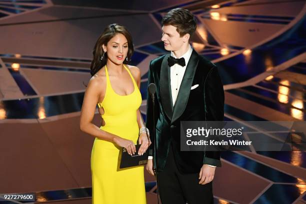 Actors Eiza Gonzalez and Ansel Elgort speak onstage during the 90th Annual Academy Awards at the Dolby Theatre at Hollywood & Highland Center on...