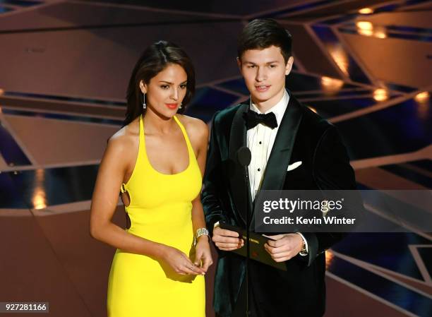 Actors Eiza Gonzalez and Ansel Elgort speak onstage during the 90th Annual Academy Awards at the Dolby Theatre at Hollywood & Highland Center on...