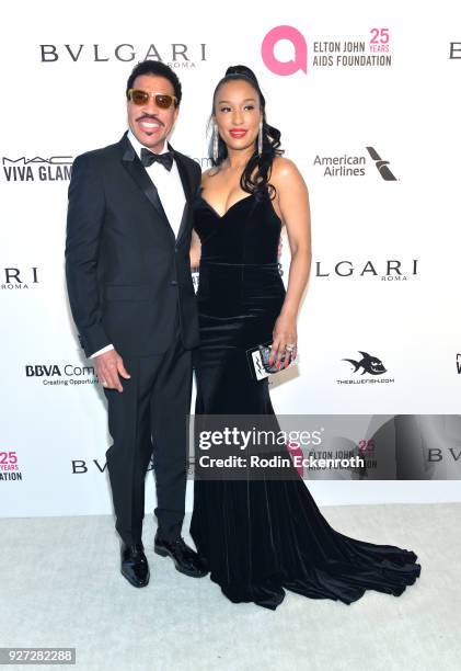 Lionel Richie and Lisa Parigi attend the 26th annual Elton John AIDS Foundation's Academy Awards Viewing Party at The City of West Hollywood Park on...