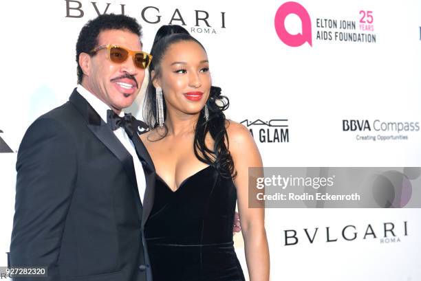 Lionel Richie and Lisa Parigi attend the 26th annual Elton John AIDS Foundation's Academy Awards Viewing Party at The City of West Hollywood Park on...