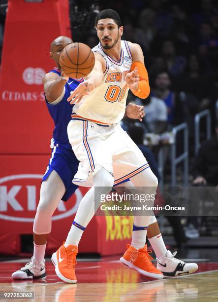 Williams of the Los Angeles Clippers guards Enes Kanter of the New York Knicks in the game at Staples Center on March 2, 2018 in Los Angeles,...