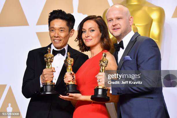 Kazuhiro Tsuji, Lucy Sibbick, and David Malinowski winners of the Best Makeup for Darkest Hour pose in the press room during the 90th Annual...