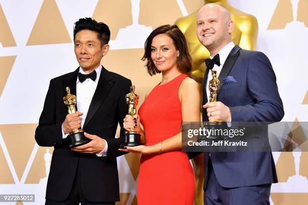 Kazuhiro Tsuji, Lucy Sibbick, and David Malinowski winners of the Best Makeup for Darkest Hour pose in the press room during the 90th Annual...