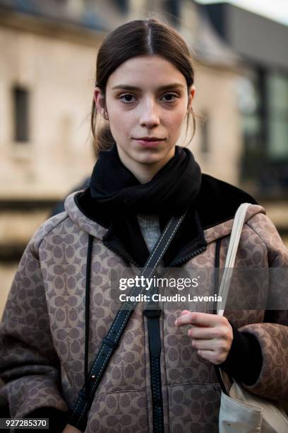 Model, wearing Coach jacket, is seen in the streets of Paris after the Valentino show during Paris Fashion Week Womenswear Fall/Winter 2018/2019 on...