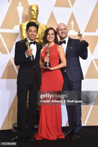 Kazuhiro Tsuji, Lucy Sibbick, and David Malinowski winners of the Best Makeup for Darkest Hour pose in the press room during the 90th Annual...