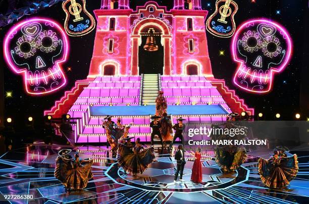 Singer Miguel and Mexican singer Natalia Lafourcade perform during the 90th Annual Academy Awards show on March 4, 2018 in Hollywood, California.