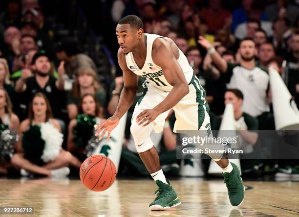 Lourawls Nairn Jr. #11 of the Michigan State Spartans in action against the Michigan Wolverines during the semifinals of the Big Ten Basketball...