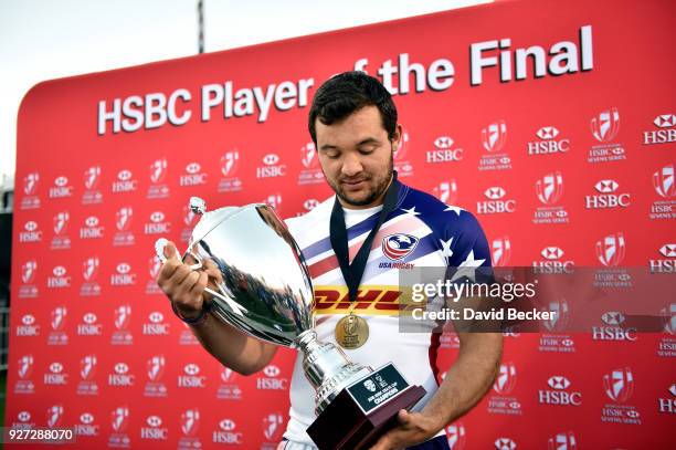 Chris Mattina of the United States holds the Cup Final trophy after the team defeated Argentina at the HSBC USA Sevens at Sam Boyd Stadium on March...