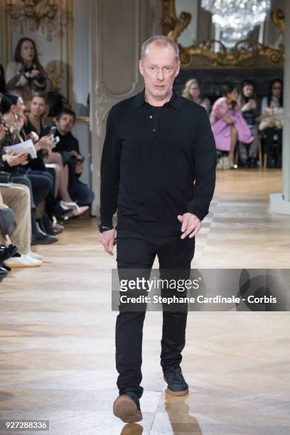 Designer Bill Gaytten walks the runway during the John Galliano show as part of the Paris Fashion Week Womenswear Fall/Winter 2018/2019 on March 4,...