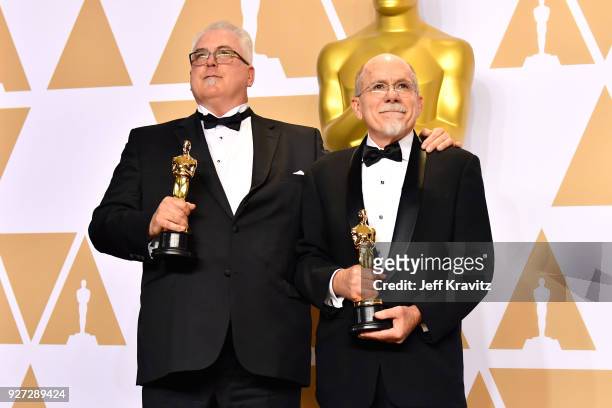 Sound editors Alex Gibson and Richard King, winners of the Best Sound Editing award for 'Dunkirk, pose in the press room during the 90th Annual...