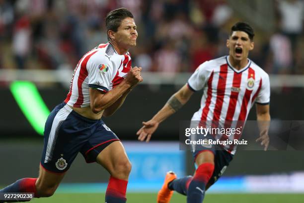 Jesus Godínez of Chivas celebrates after scoring the first goal of his team during the 10th round match between Chivas and America as part of the...