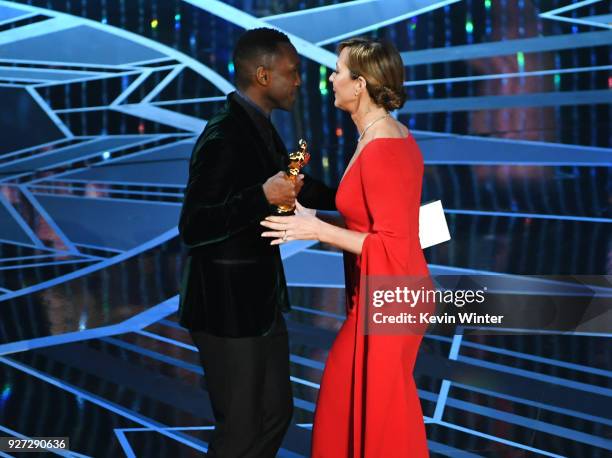 Actor Allison Janney accepts Best Supporting Actress for 'I, Tonya' from actor Mahershala Ali onstage during the 90th Annual Academy Awards at the...