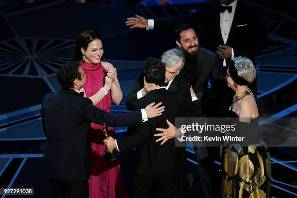 Director Sebastian Lelio accepts Best Foreign Language Film for 'A Fantastic Woman' with cast/crew onstage and actor Rita Moreno during the 90th...