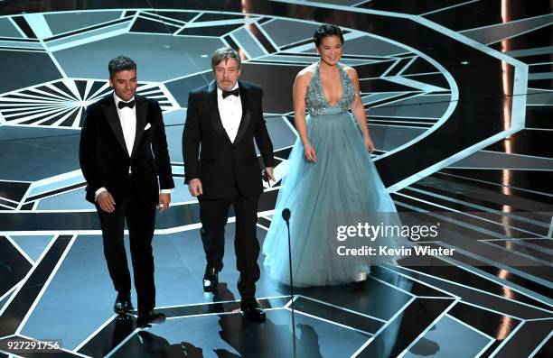 Actors Oscar Isaac, Mark Hamill and Kelly Marie Tran walk onstage during the 90th Annual Academy Awards at the Dolby Theatre at Hollywood & Highland...