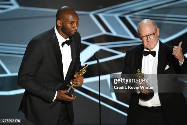 Filmmakers Kobe Bryant and Glen Keane accept Best Animated Short Film for 'Dear Basketball' onstage during the 90th Annual Academy Awards at the...