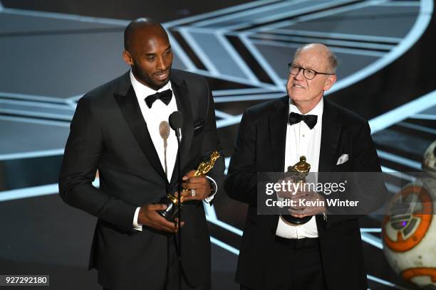 Filmmakers Kobe Bryant and Glen Keane accept Best Animated Short Film for 'Dear Basketball' onstage during the 90th Annual Academy Awards at the...