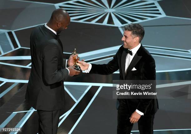 Filmmaker Kobe Bryant accepts Best Animated Short Film for 'Dear Basketball' from actor Oscar Isaac onstage during the 90th Annual Academy Awards at...