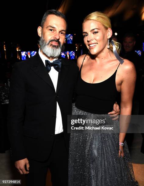 Marc Silverstein and Busy Philipps attend the 26th annual Elton John AIDS Foundation Academy Awards Viewing Party sponsored by Bulgari, celebrating...