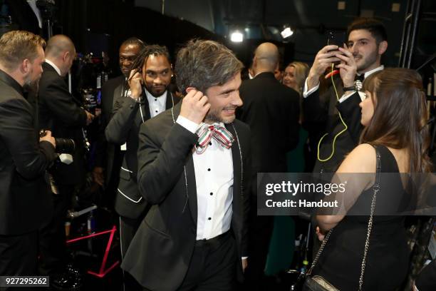 In this handout provided by A.M.P.A.S., Gael Garcia Bernal and Miguel attends the 90th Annual Academy Awards at the Dolby Theatre on March 4, 2018 in...
