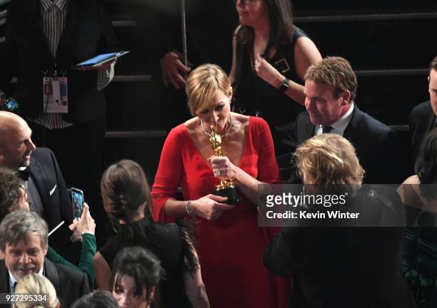 Actor Allison Janney with her Oscar for Best Supporting Actress for 'I, Tonya' with screenwriter Steven Rogers during the 90th Annual Academy Awards...