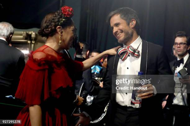 In this handout provided by A.M.P.A.S., Natalia Lafourcade and Gael Garcia Bernal attend the 90th Annual Academy Awards at the Dolby Theatre on March...