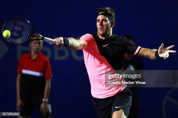 Juan Martin del Potro of Argentina returns a shot during the Championship match between Kevin Anderson of South Africa and Juan Martin del Potro of...