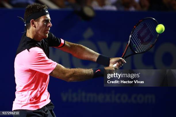 Juan Martin del Potro of Argentina returns a shot during the Championship match between Kevin Anderson of South Africa and Juan Martin del Potro of...