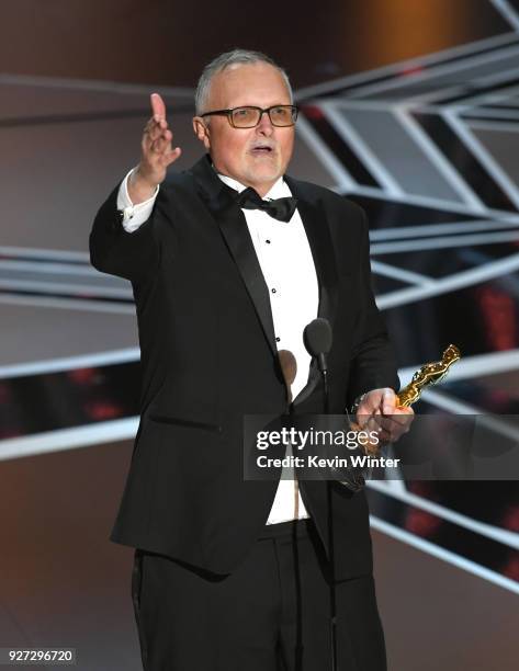 Editor Lee Smith accepts Best Film Editing for 'Dunkirk' onstage during the 90th Annual Academy Awards at the Dolby Theatre at Hollywood & Highland...