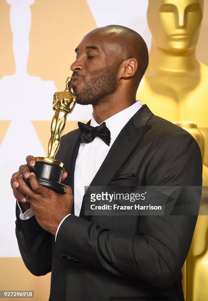 Filmmaker Kobe Bryant, winner of the Best Animated Short Film award for 'Dear Basketball,' poses in the press room during the 90th Annual Academy...