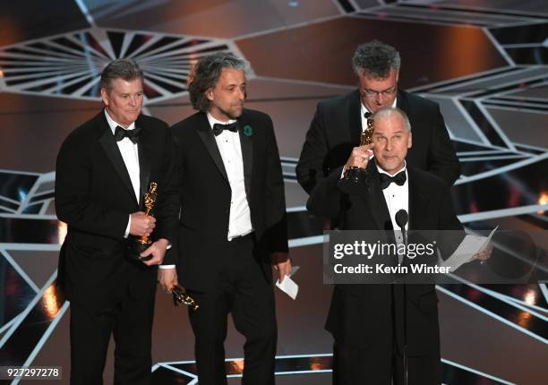 Visual effects artists Richard R. Hoover, Paul Lambert, Gerd Nefzer, and John Nelson accept Best Visual Effects for 'Blade Runner 2049' onstage...